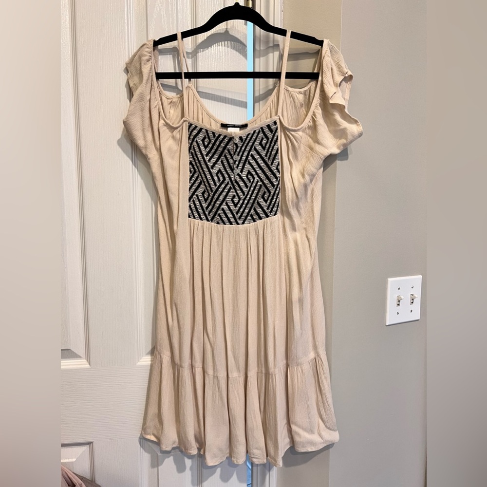 VERY cute shoulder cut dress.  Cream worn twice.  Flowy and fun.